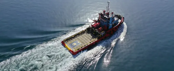 A tugboat sailing in the ocean.